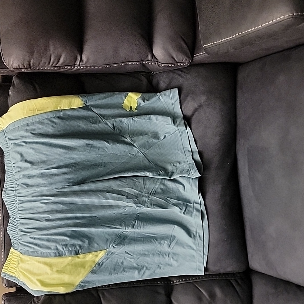 Size XL Green Puma shorts. 100% polyester. Great condition.